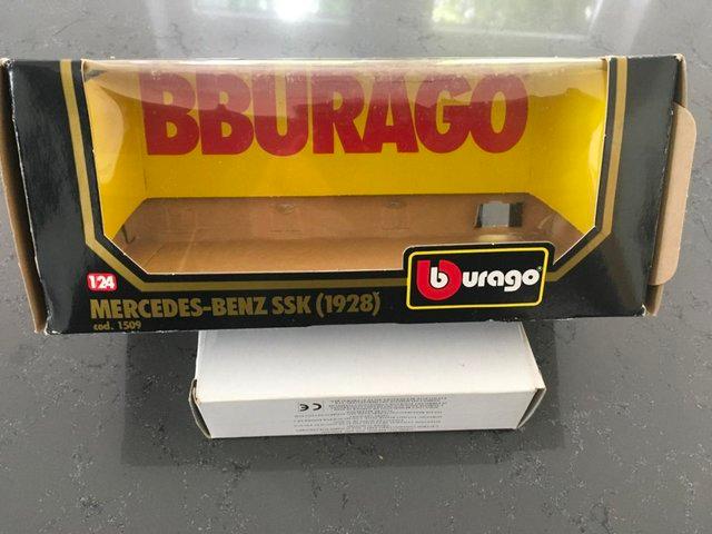 Preview of the first image of Burago scale model car still boxed.