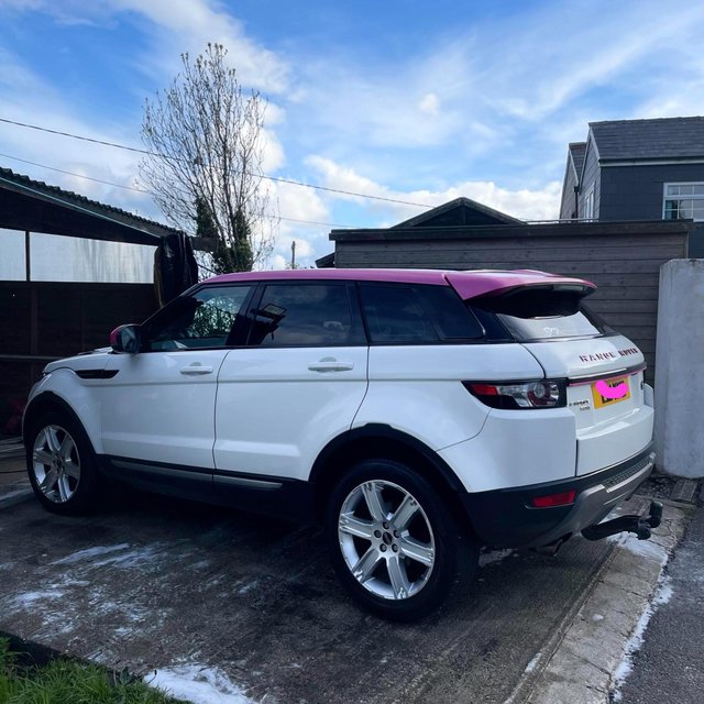 Preview of the first image of Pink & white Range Rover evoque..