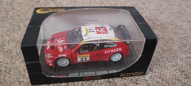 Preview of the first image of boxed citroen xsara wrc 2002 rally die cast metal scale mode.