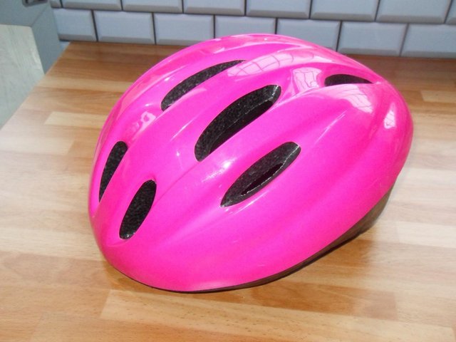 two cycling helmets like new - £5