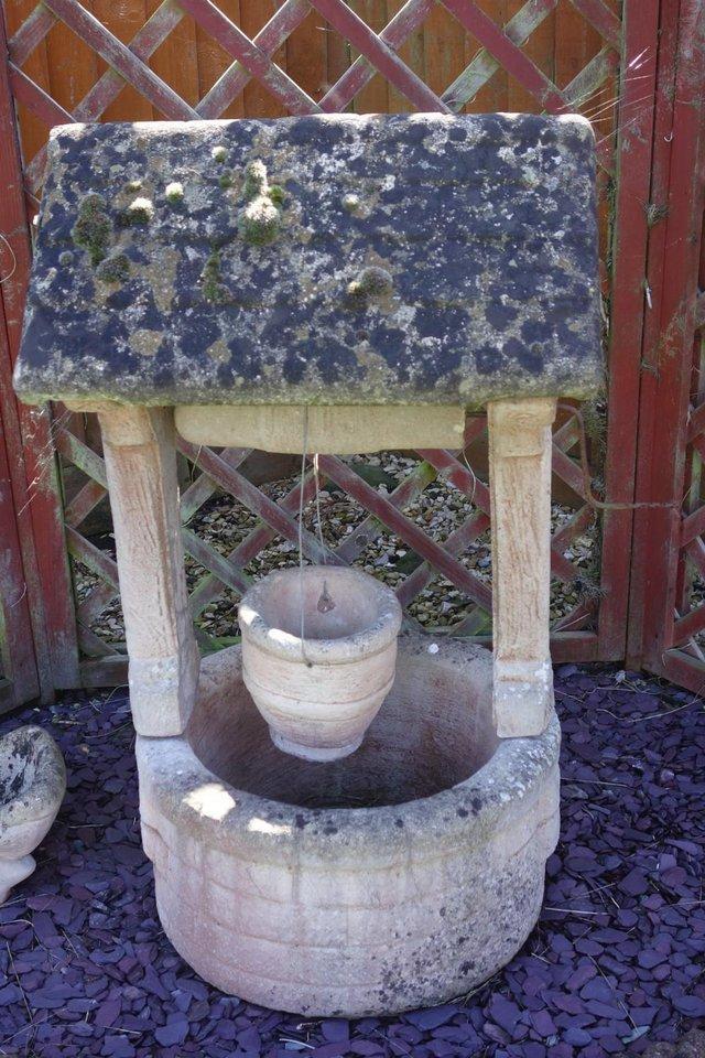 Preview of the first image of Garden Feature Cement Wishing Well Planter.