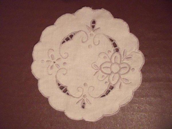 Image 1 of Vintage cut out work/beige embroidered white linen doily.