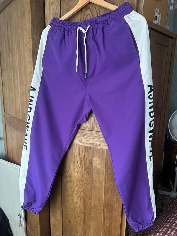 Purple windbreaker tracksuit joggers, size small