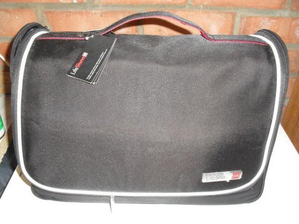 Image 1 of New Black lifeshine bag with compartment