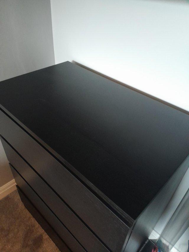 Preview of the first image of Ikea Malm 4 Drawer Black.
