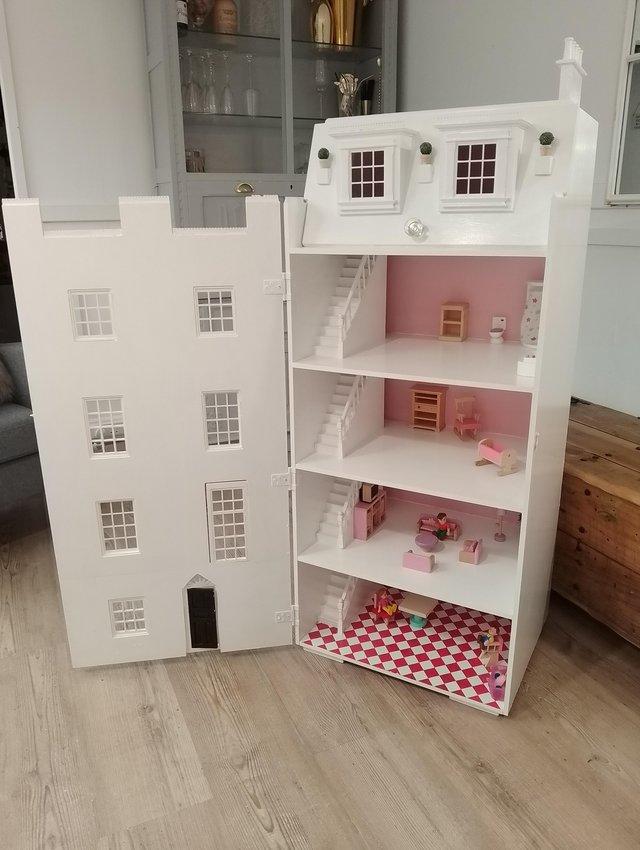 Preview of the first image of Stunning handmade Victorian dolls house.