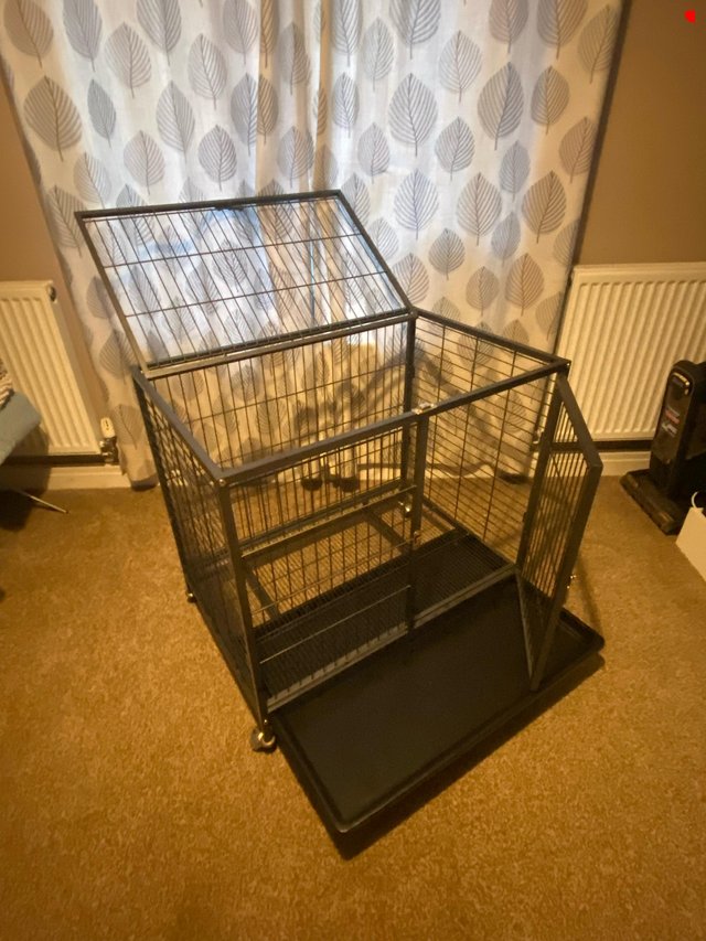 Preview of the first image of Medium size sturdy metal dog crate..