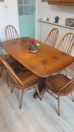 Image 3 of Ercol Elm Refectory table and six Quaker chairs golden dawn
