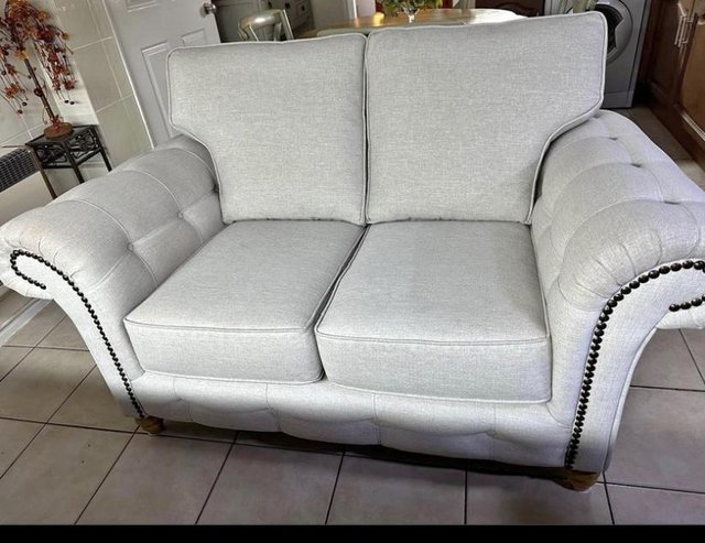 Preview of the first image of Two seater sofa very condition.