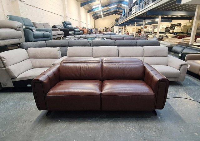 Preview of the first image of Vita brown leather electric recliner 3 seater sofa.