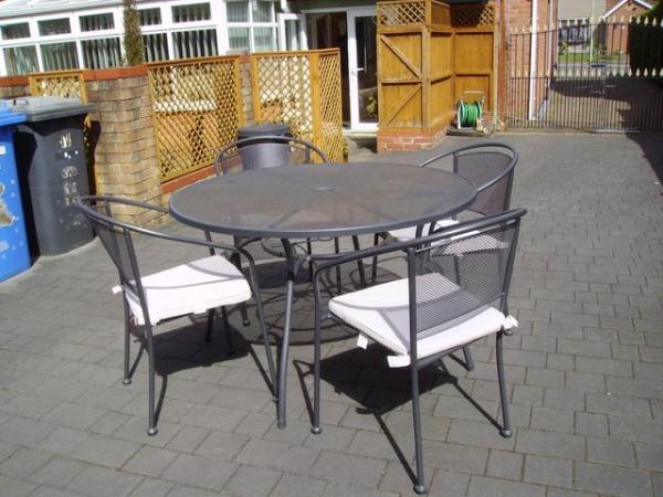 Image 3 of Grey metal garden table & 4 chairs with pads