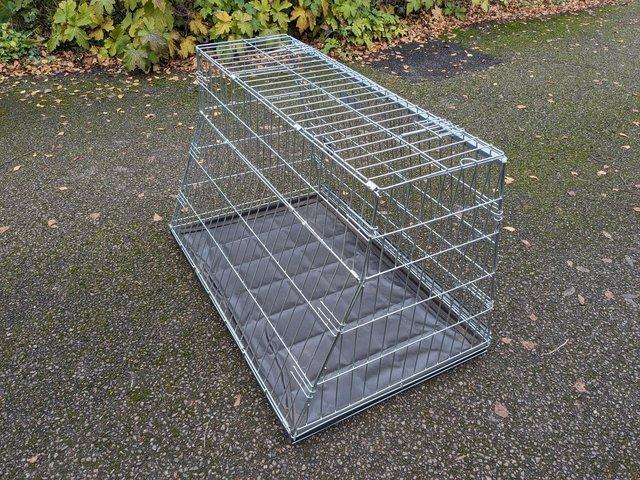 Preview of the first image of Dog Crate for sale. Large. Hatchback style.