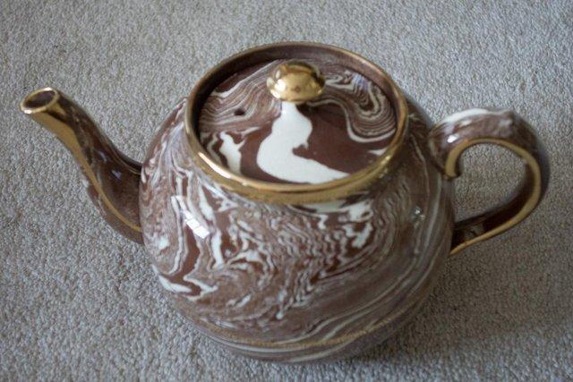 Preview of the first image of Sudlow Slipware Decorated Functional Betty Teapot.