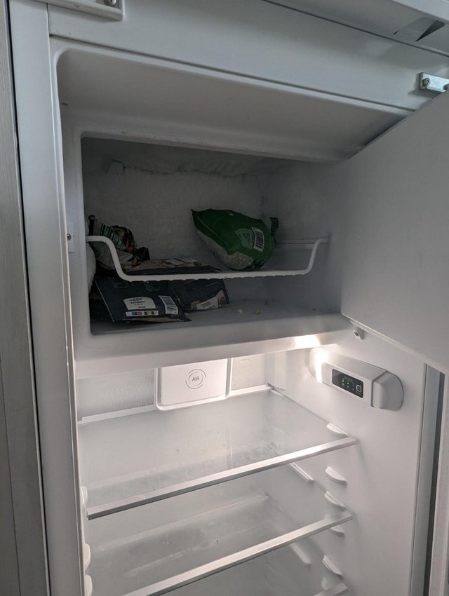 Preview of the first image of Integrated Fridge Freezer (£475 new) 178cm tall.