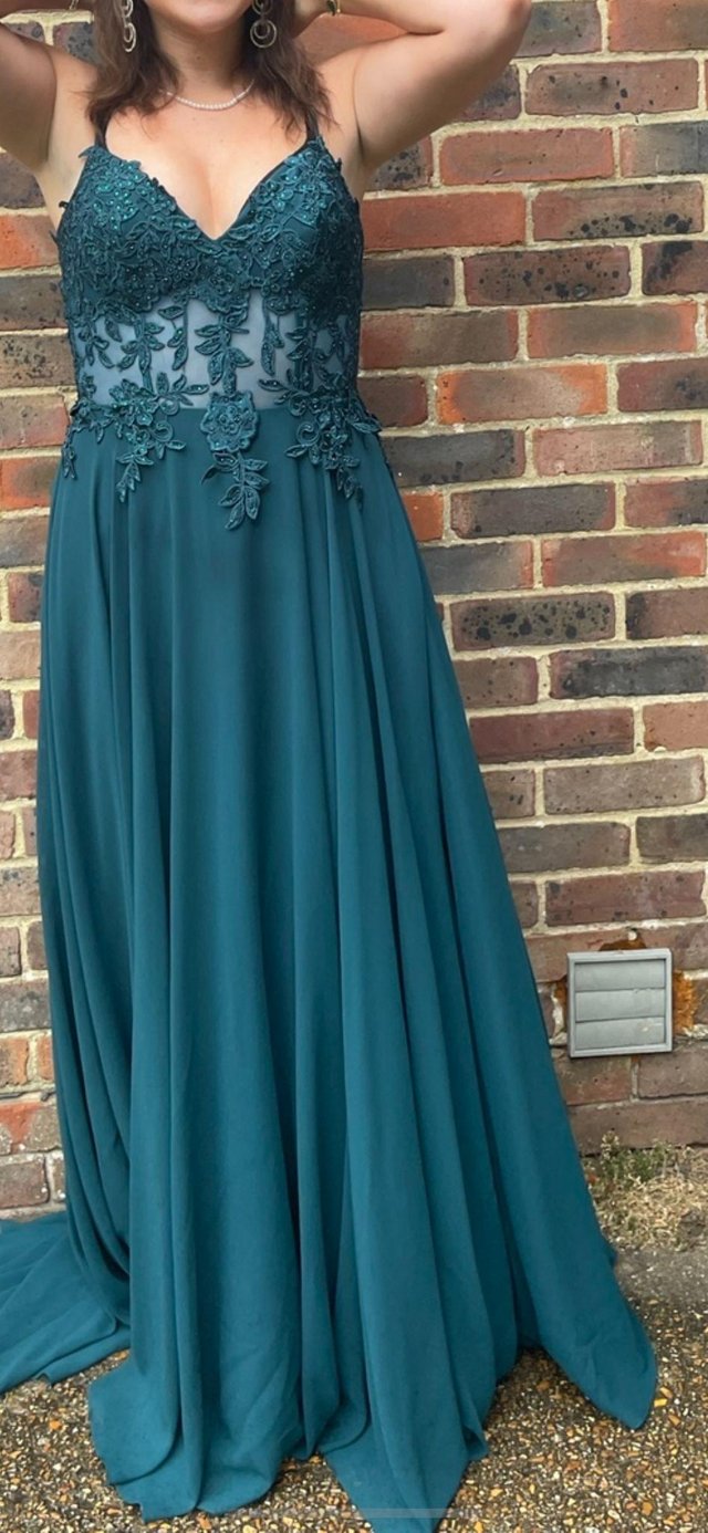 Preview of the first image of Stunning Emerald Prom Dress with embellished bodice.
