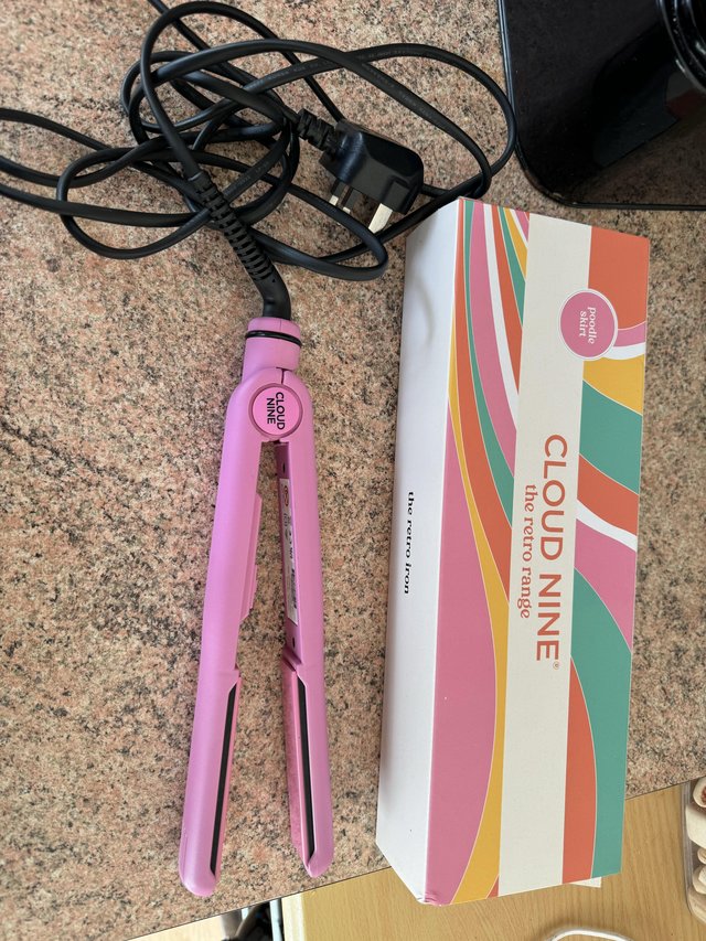 Preview of the first image of Cloud nine pink hair straighteners(nearly new).