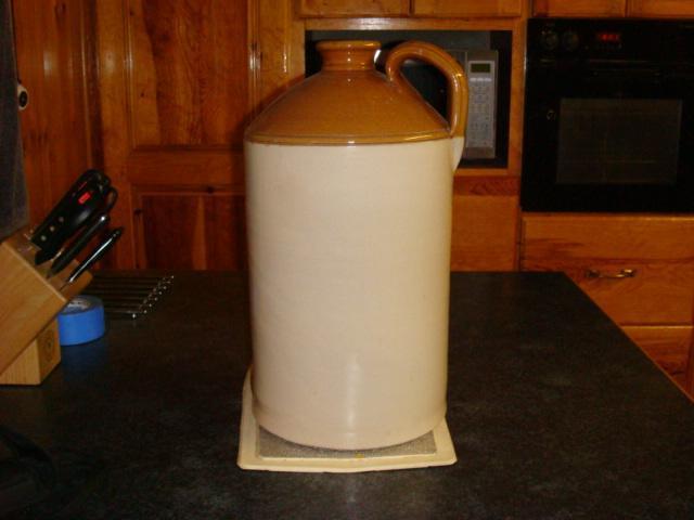 Preview of the first image of Antique Earthenware coloured Flagon..