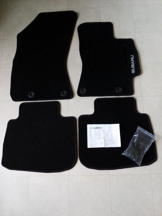 Preview of the first image of Genuine Subaru Outback car mat set.