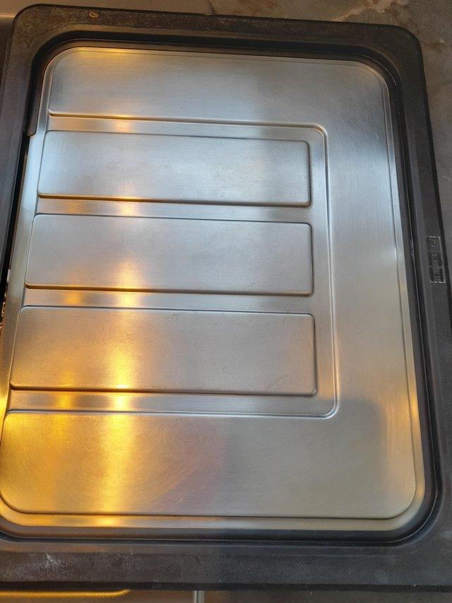 Preview of the first image of Franke stainless steel draining board fo under mounted sink.