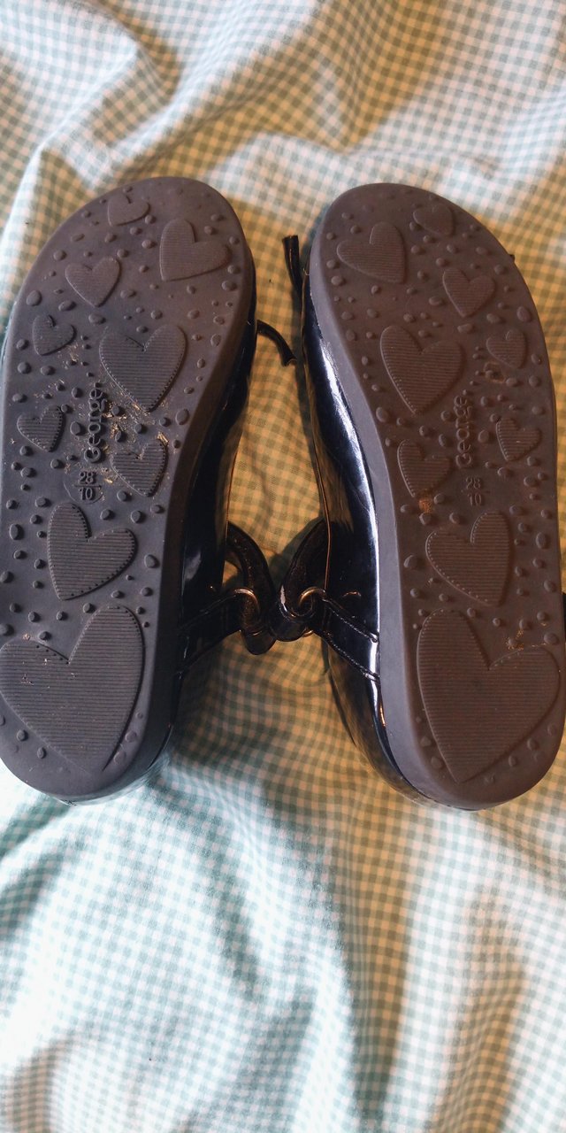 Preview of the first image of Kids black shoes.size 10 in kids size.
