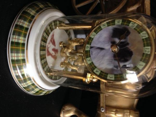 Image 1 of CLOCKS.as shown. .working order.. downsizing.