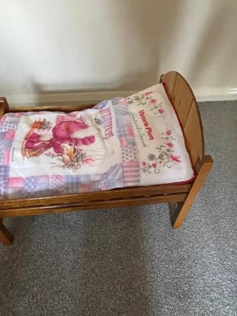 Image 1 of Dolls cot with bed linen