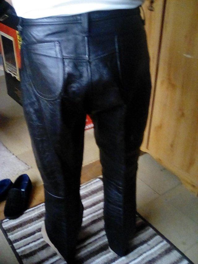 Preview of the first image of Men's Black leather riding pants.