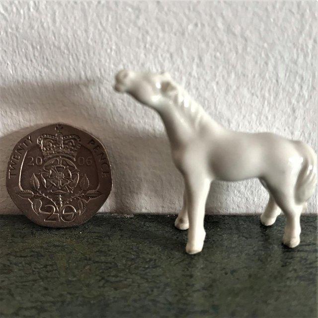 Preview of the first image of Tiny vintage 1960's white ceramic horse, damage..