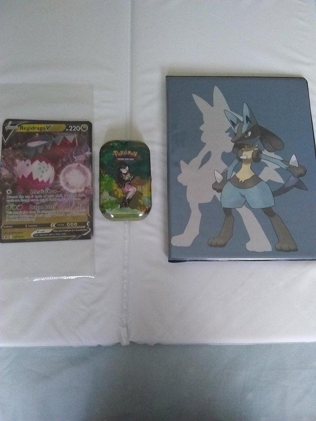 Preview of the first image of Pokemon card sets plus tin of cards and promotion cards.