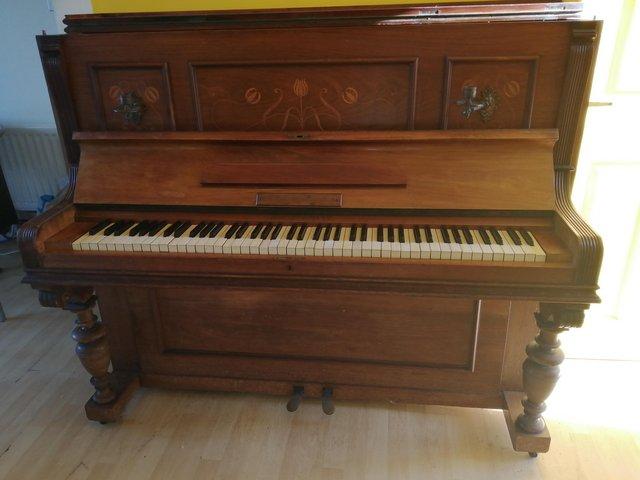Preview of the first image of Piano around 1920upright Liebling Berlin.