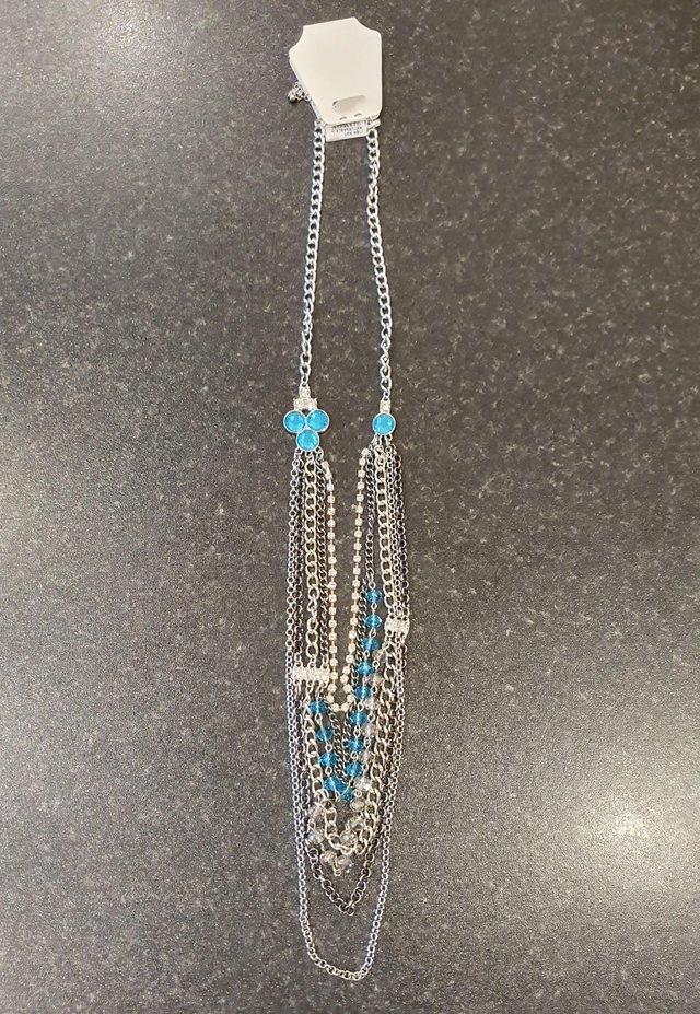 Preview of the first image of Silver colour dimante and turquoise gemstone necklace.