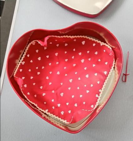 Image 22 of Red Heart Shaped Tin with Party Accessories.
