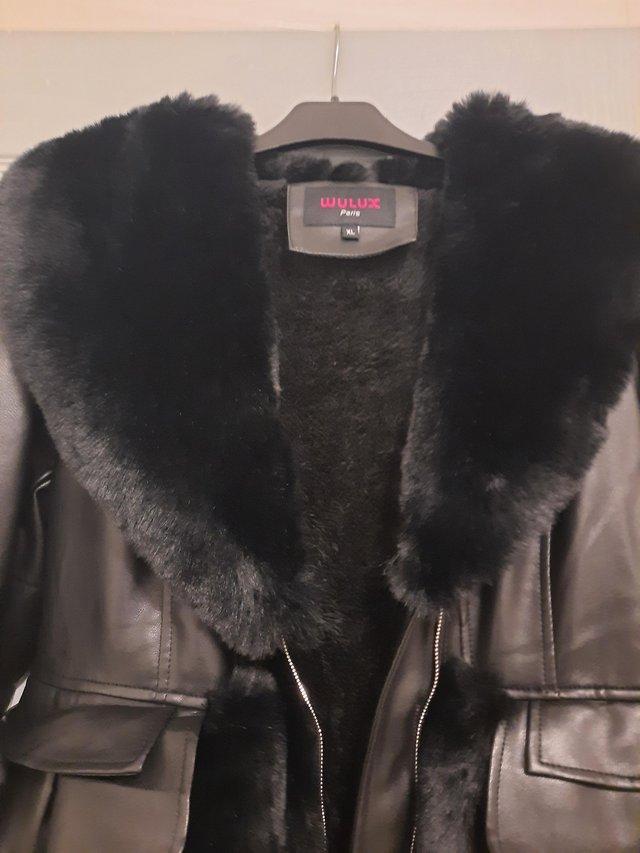 Preview of the first image of Ladies pairs coat size 12/14.