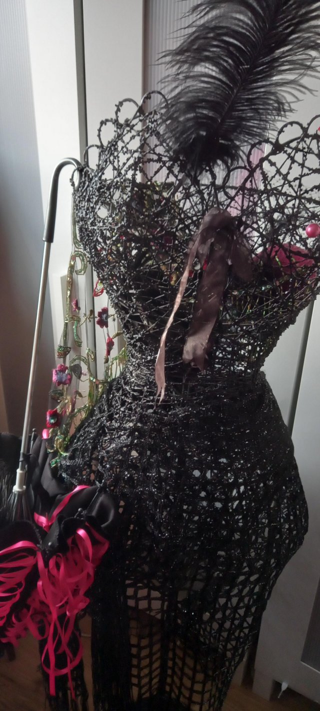 Preview of the first image of A Unique black metal diamente decorative mannequin.
