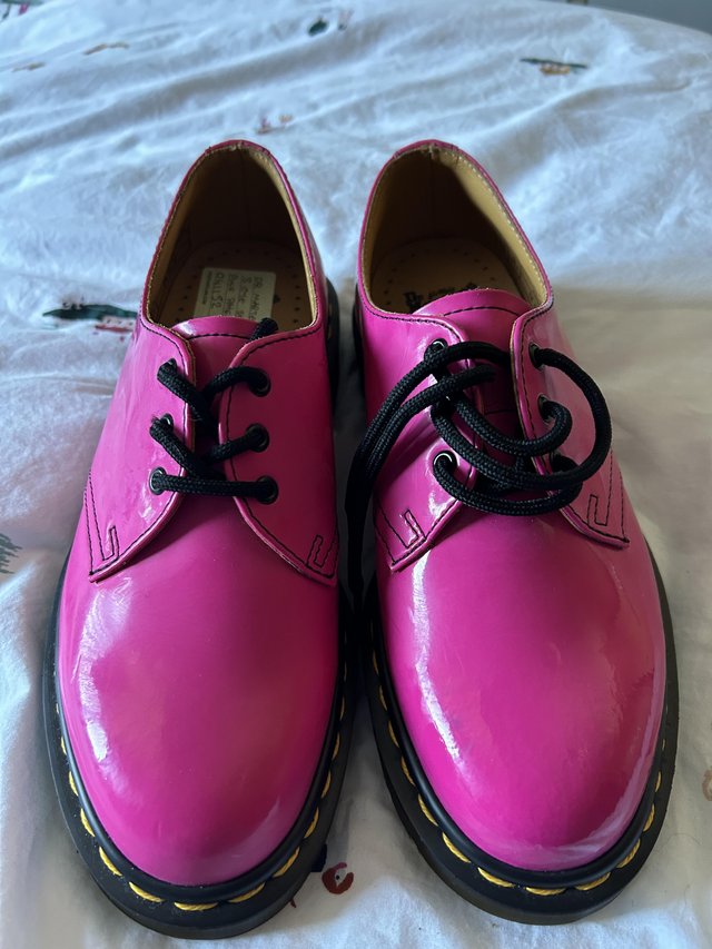 Preview of the first image of Dr Martens BNWT ladies lace up shoes bright pink patent.