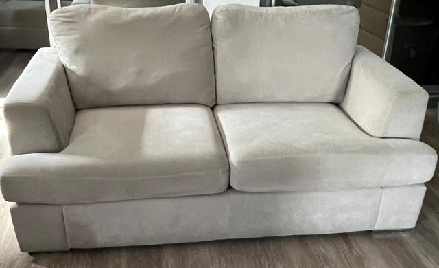Image 1 of Sofa bed with matching footstool