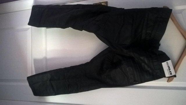 Preview of the first image of police 883 black jeans size 34.