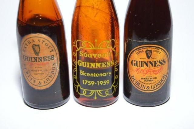 Preview of the first image of lThree vintage GUINNESS 1950s miniature bottles including 19.
