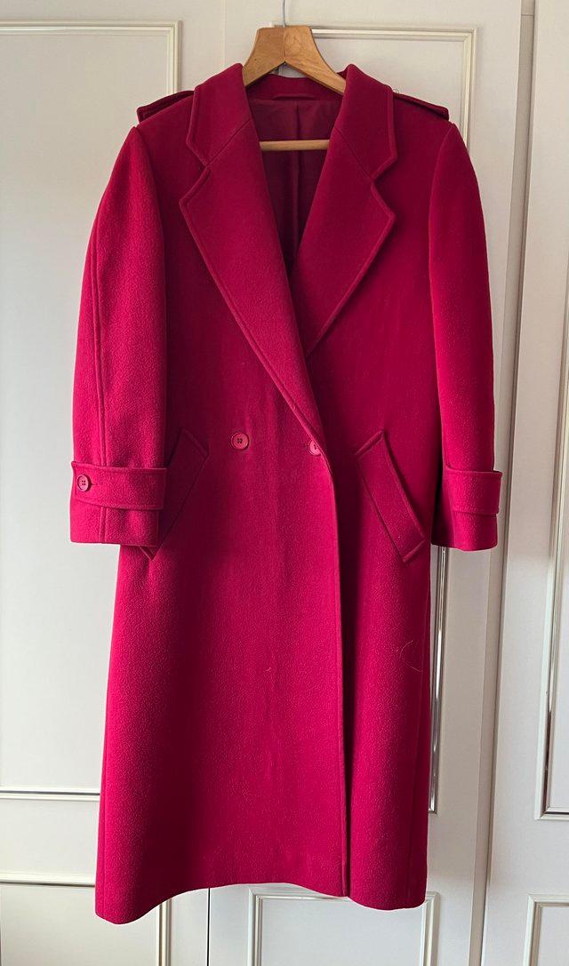 Preview of the first image of Ladies all wool midi length coat.