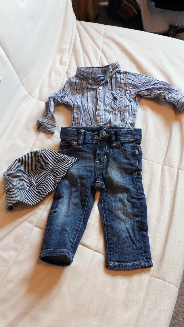 Preview of the first image of Baby boys jeans shirt and hat set, aged 6-12 months.