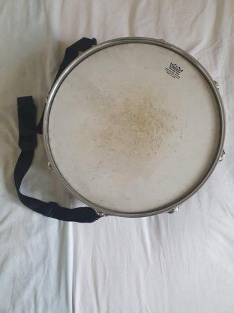 Image 1 of REMO Drum with strap attached. Black.