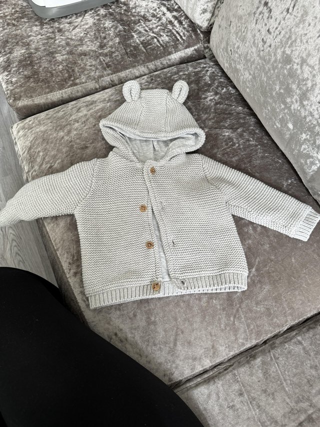 Preview of the first image of 6 - 9 months old cardigan.