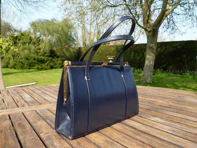 Preview of the first image of Navy leather handbag by Garfields of London (price inc P&P).