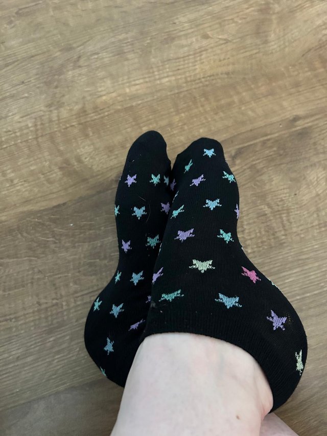 Preview of the first image of Ladies worn star trainer socks.