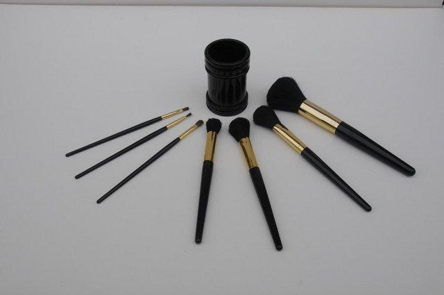Preview of the first image of Seven Different Sized Soft Makeup Brushes With Storage Pot.