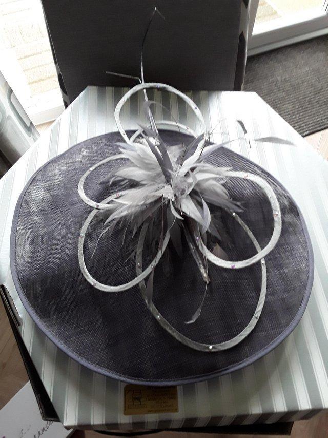 Preview of the first image of Mauve coloured wedding hat for mother of the bride.