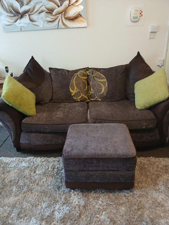Preview of the first image of 3 seater sofa in great condition with pouffe.