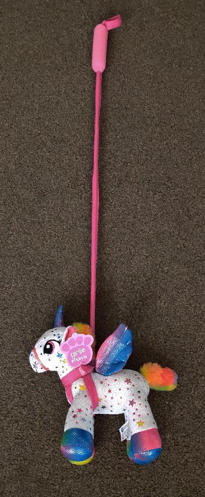 Preview of the first image of Bnwt Girlie Paws Rainbow Unicorn With Removable Lead.
