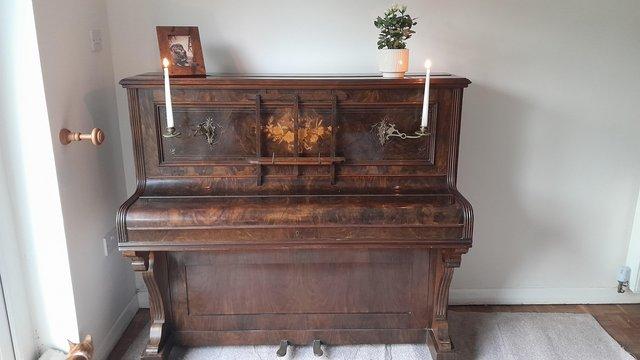 Preview of the first image of Bogg and Sons Upright Piano Free.