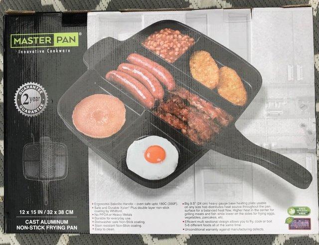 Preview of the first image of Cast Iron 5-section Frying Pan Skillet - Brand New in Box.